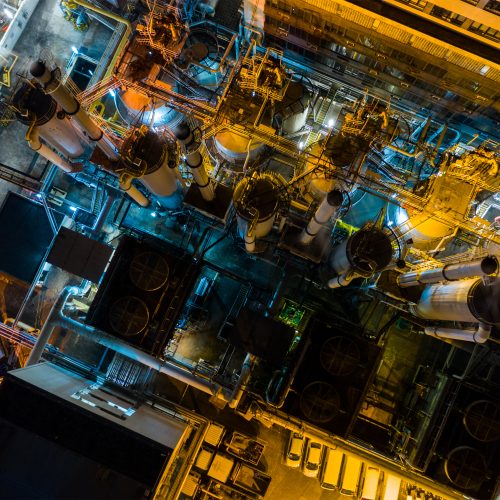 Scientist conducting advanced electrochemical process in laboratory environment